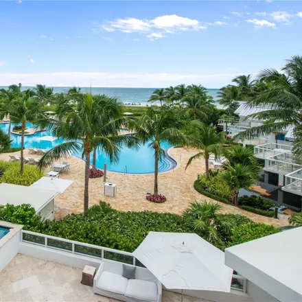 Rent this 4 bed townhouse on Continuum at South Beach II in 200 South Pointe Drive, Miami Beach