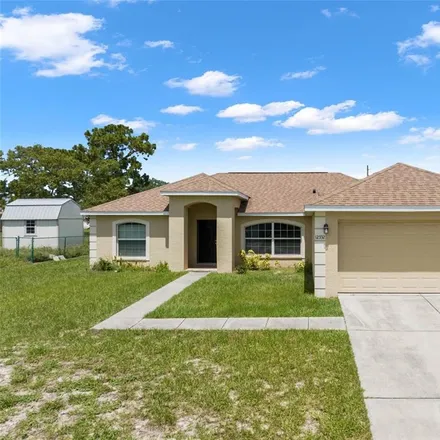 Buy this 3 bed house on 12332 Corrine Avenue in Spring Hill, FL 34609