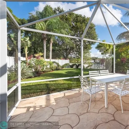 Buy this 4 bed house on 9952 Northwest 2nd Court in Plantation, FL 33324