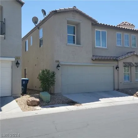Rent this 4 bed house on 5660 Woods Crossing Street in Spring Valley, NV 89148