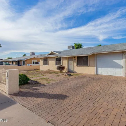 Rent this 3 bed house on 694 East Erie Street in Chandler, AZ 85225