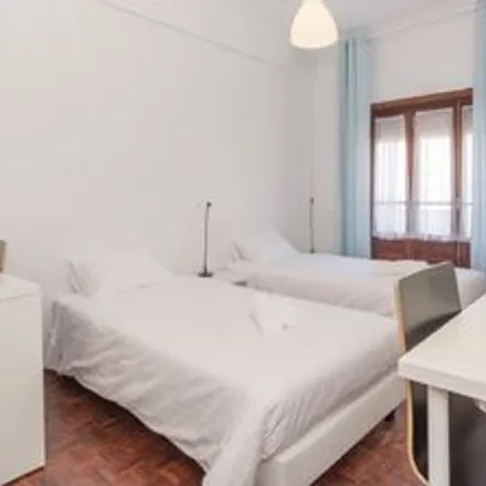 Rent this 4 bed room on Rua de Almada