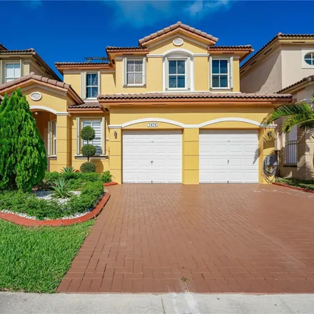 Buy this 4 bed townhouse on 7474 Northwest 113th Court in Medley, Doral