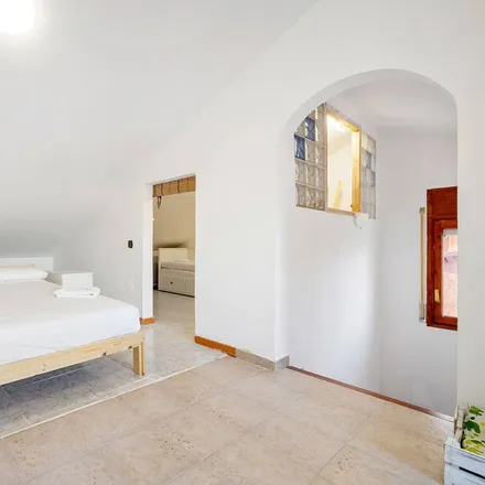 Rent this 4 bed house on 43761 la Pobla de Montornès
