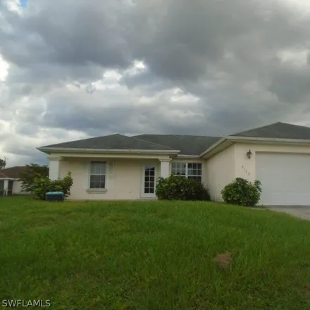 Buy this 3 bed house on 2613 4th Street Southwest in Lehigh Acres, FL 33976