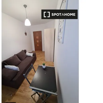 Rent this 5 bed room on Kolejowa 11 in 60-718 Poznan, Poland