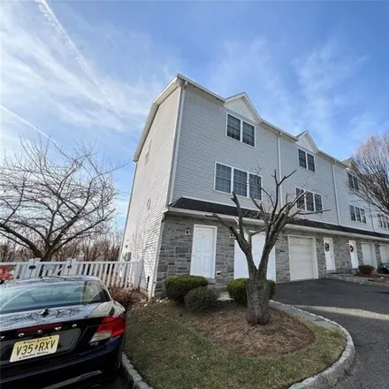 Rent this 2 bed townhouse on 124 Home Pl Unit 9 in Lodi, New Jersey