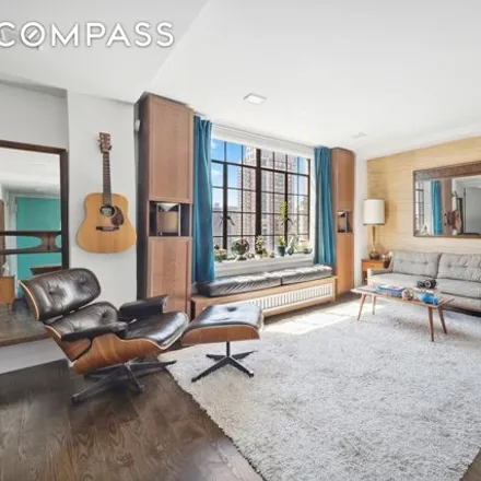 Buy this studio apartment on Woodstock Tower in 320 East 42nd Street, New York