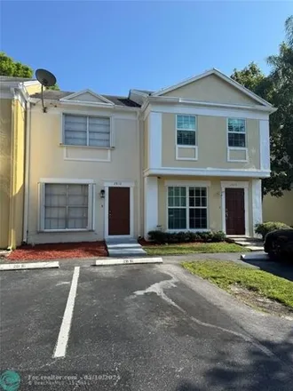 Rent this 2 bed townhouse on 11410 Cambridge Lane in Cooper City, FL 33025