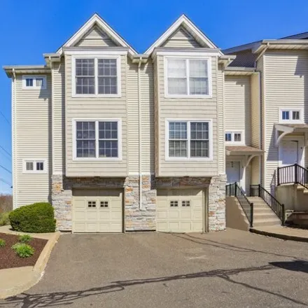 Buy this 2 bed townhouse on Woodcrest Lane in Danbury, CT 06801