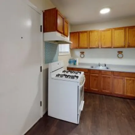 Rent this 3 bed apartment on 14820 Maplewood Avenue