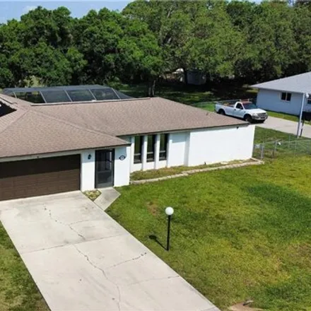 Buy this 2 bed house on 163 Roosevelt Avenue in Lehigh Acres, FL 33936