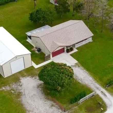 Buy this 3 bed house on 16379 61st Pl N in Loxahatchee, Florida