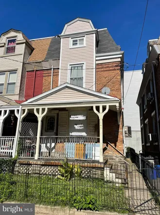 Buy this 5 bed townhouse on 5541 Pulaski Avenue in Philadelphia, PA 19144