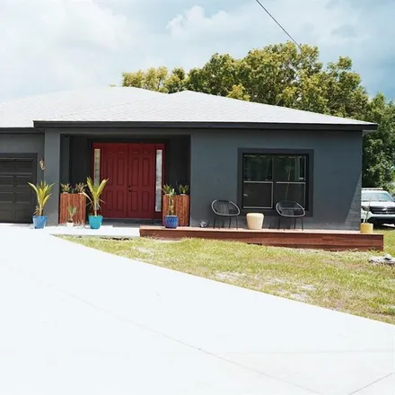 Rent this 4 bed house on 1611 Carolyn Court in Saint Cloud, FL 34769