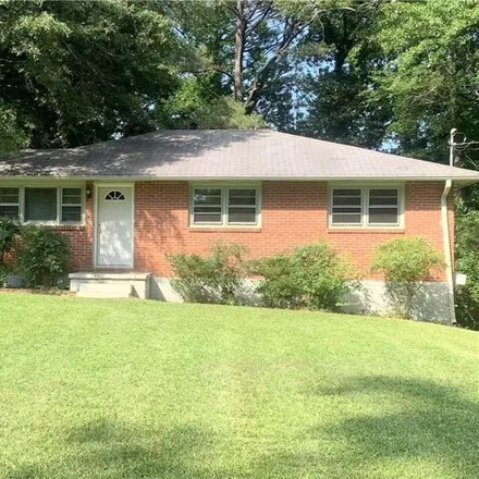 Rent this 3 bed house on 2682 Woodridge Drive in Scottdale, GA 30033