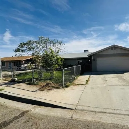 Buy this 3 bed house on 1707 West 26th Drive in Yuma, AZ 85364