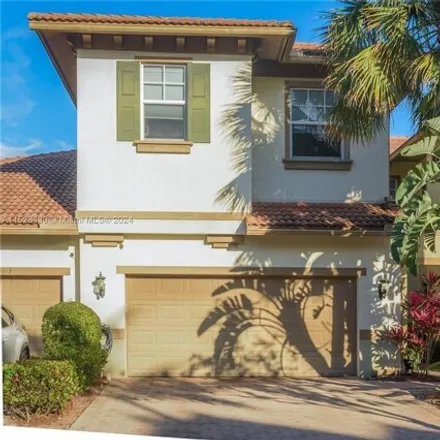 Buy this 4 bed house on 6017 Northwest 118th Drive in Heron Bay South, Coral Springs