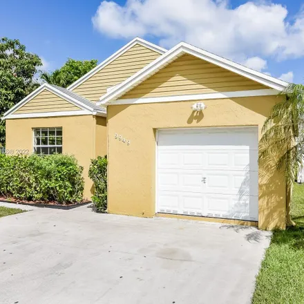 Rent this 3 bed house on 9959 West Daffodil Lane in Miramar, FL 33025