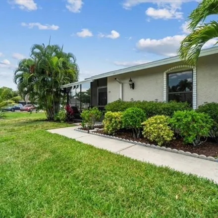 Buy this 2 bed condo on 5130 Southwest Courtyards Court in Cape Coral, FL 33914