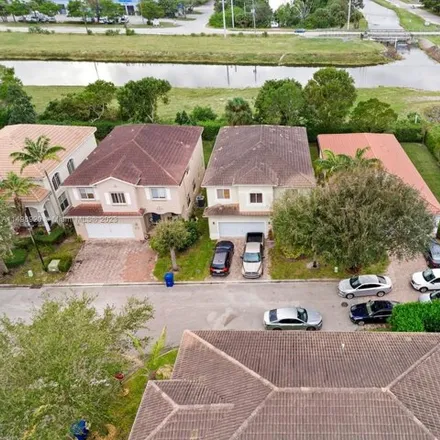 Buy this 5 bed house on 1296 Rose Gate Boulevard in Riviera Beach, FL 33404