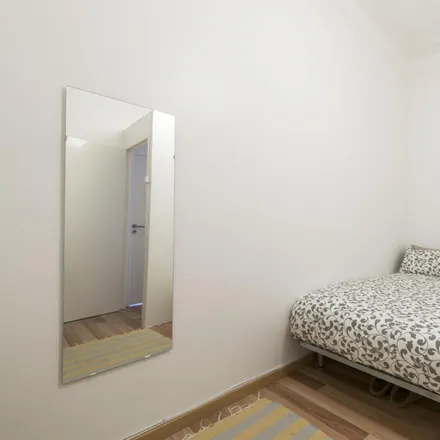 Rent this 6 bed room on Rua de Macau in 1170-132 Lisbon, Portugal