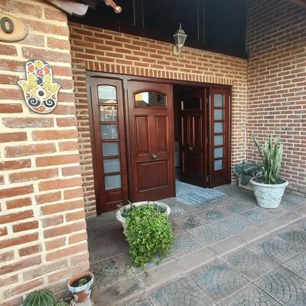 Buy this 4 bed house on Amable Jones 66 in Partido de Marcos Paz, Marcos Paz