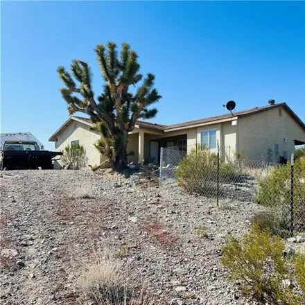 Buy this 2 bed house on 1733 Sentinal Drive in Mohave County, AZ 86444