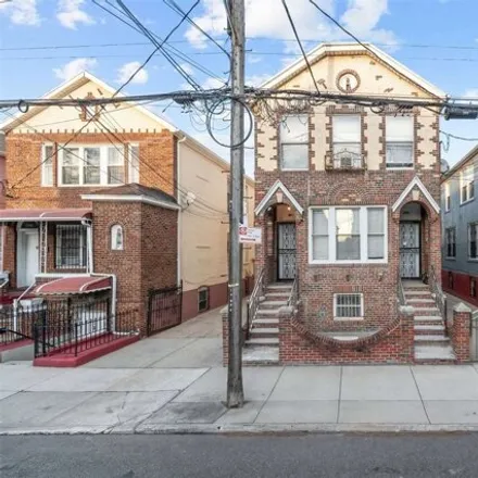 Buy this 8 bed house on 663 East 91st Street in New York, NY 11236