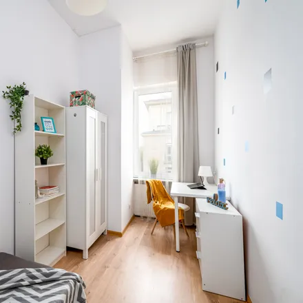 Rent this 5 bed room on Marshal Street 28 in 00-576 Warsaw, Poland
