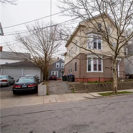 Buy this 9 bed townhouse on 75 Laban Street in Olneyville, Providence