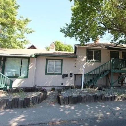 Buy this 8 bed house on 1951 East Wellesley Avenue in Spokane, WA 99207