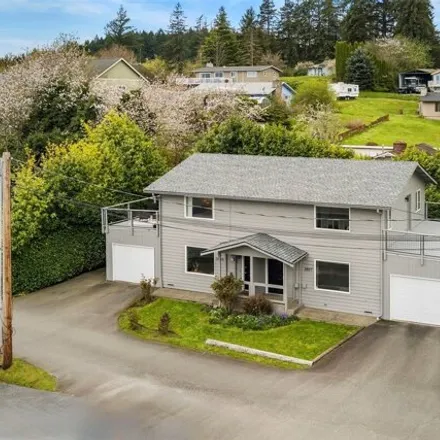 Buy this 4 bed house on 3801 Northwest Munson Street in Silverdale, WA 98383