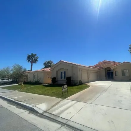 Rent this 4 bed house on 79533 Morning Glory Court in La Quinta, CA 92253
