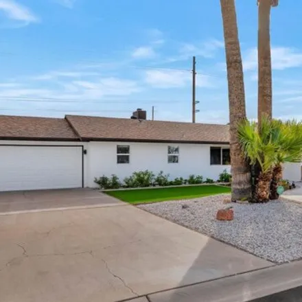 Rent this 4 bed house on 5341 North Woodmere Fairway in Scottsdale, AZ 85250