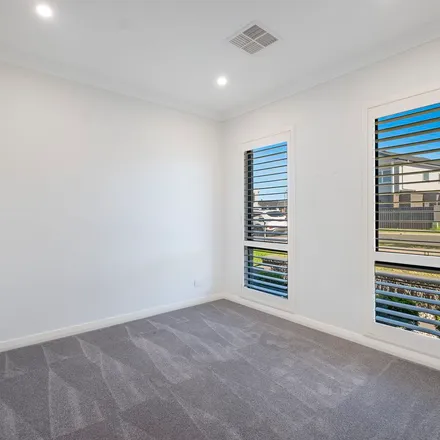 Rent this 4 bed apartment on 198 Village Circuit in Gregory Hills NSW 2557, Australia