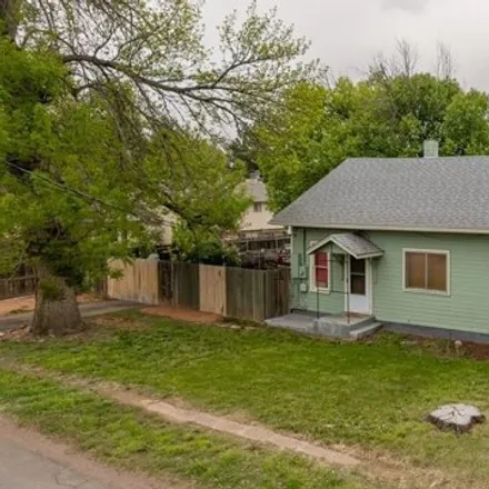 Buy this 3 bed house on 1550 Colorado Avenue in Lincoln Park, Fremont County