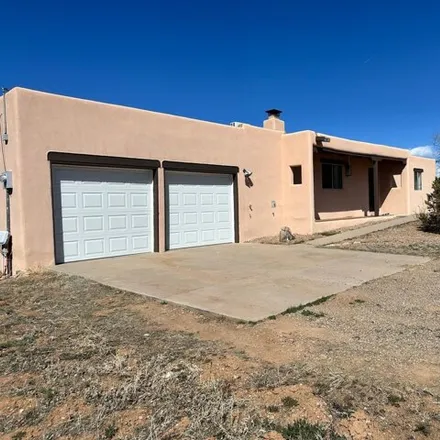 Buy this 4 bed house on 4 Torneo Road in Santa Fe County, NM 87508