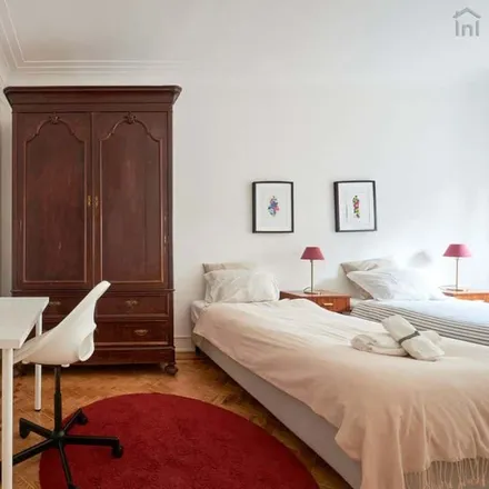 Rent this 7 bed room on Rua João de Menezes 13 in 1900-024 Lisbon, Portugal