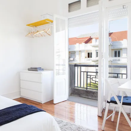 Rent this 7 bed room on Avenida Ressano Garcia 11 in 1070-234 Lisbon, Portugal