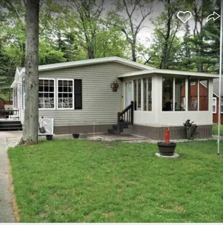 Buy this 3 bed house on 164 Cottage Drive in Houghton Lake, Denton Township