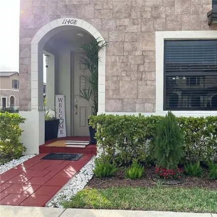 Buy this 3 bed townhouse on unnamed road in Hialeah, FL 33018