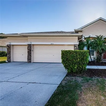 Rent this 4 bed house on 2463 Mountain Ash Way in Holiday, FL 34655