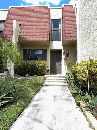 Rent this 2 bed townhouse on 8971-8985 Palm Tree Lane in Pembroke Pines, FL 33024