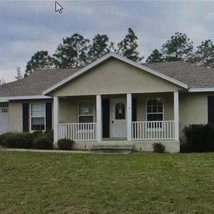 Rent this 3 bed house on 85 Redwood Road in Marion County, FL 34472