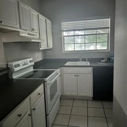 Rent this 2 bed apartment on 1821 Northwest 96th Terrace in Pembroke Pines, FL 33024