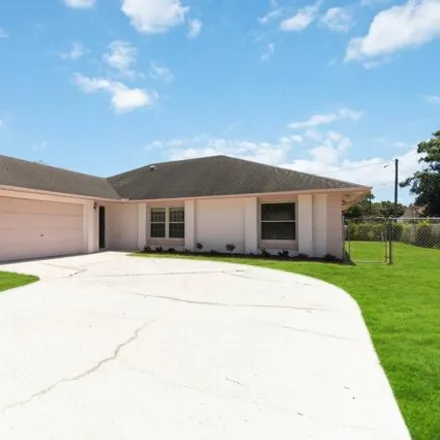 Buy this 3 bed house on 151 Gladiola Road Northeast in Palm Bay, FL 32907