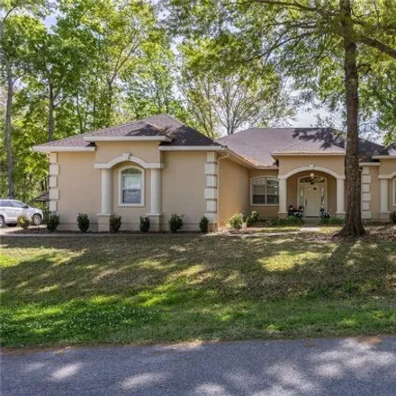 Buy this 4 bed house on 1435 Northwest 104th Drive in Alachua County, FL 32606