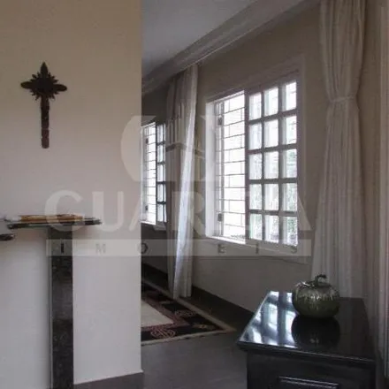 Rent this 4 bed house on Rua Paulo Derly Shell in Espírito Santo, Porto Alegre - RS
