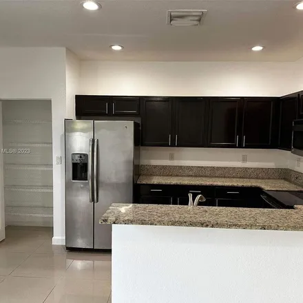 Rent this 4 bed apartment on 3327 West 90th Terrace in Hialeah, FL 33018
